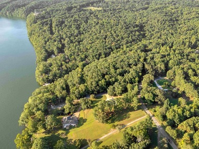Discover this rare 6.2 acre property featuring 570' feet of - photo 3