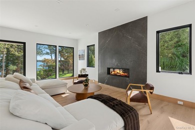 Newly completed and design-driven, this waterfront home makes a - photo 5
