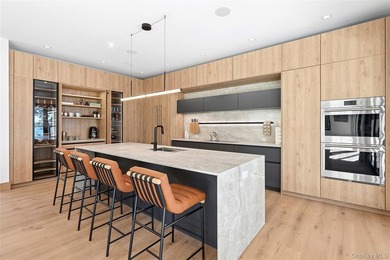 Newly completed and design-driven, this waterfront home makes a - photo 7