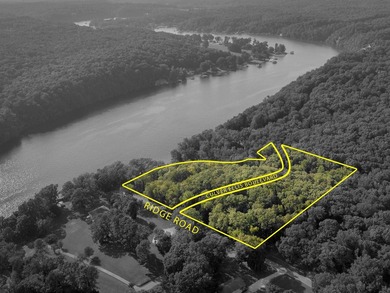 Discover this rare 6.2 acre property featuring 570' feet of - photo 6
