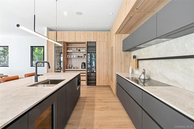 Newly completed and design-driven, this waterfront home makes a - photo 8