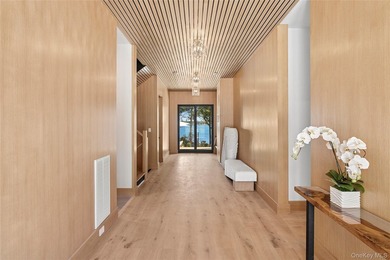 Newly completed and design-driven, this waterfront home makes a - photo 9