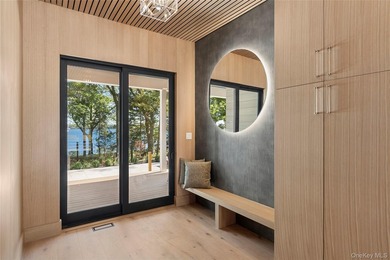 Newly completed and design-driven, this waterfront home makes a - photo 10