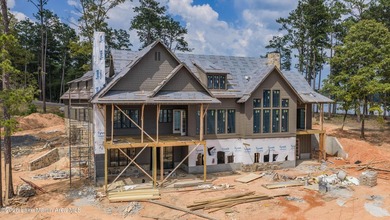 NEW CONSTRUCTION! This 6-bed, 5.5-bath custom Craftsman in The - photo 9