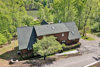 Lakefront property , 4 Bed 3 Bath log-style home in Lakeshore - photo 3