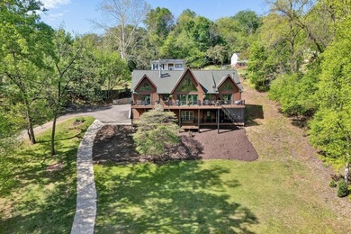 Lakefront property , 4 Bed 3 Bath log-style home in Lakeshore - photo 7
