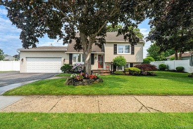Welcome to this beautifully expanded split-level home situated - photo 2