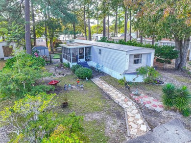 (private lake, pond, coastal) Home For Sale in Garden City Beach South Carolina