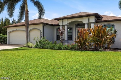 This custom-built home is loaded with EXTRAS and UPGRADES. The - photo 3