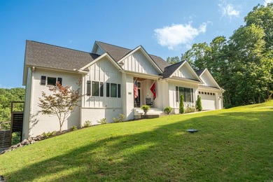 Experience luxury living on peaceful Lake Catherine in this 3 - photo 3