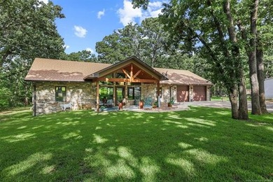 This custom-built 2022 home in Sandpoint on Lake Texoma offers - photo 1