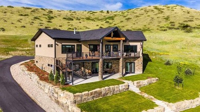 Elevated Living in The Powder Horn Golf Community! Perched above - photo 1