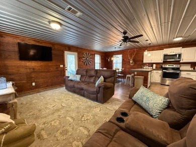 Sitting on a peaceful 24.37 just 1 mile off I22, this 2br/1ba - photo 3