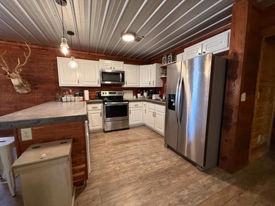 Sitting on a peaceful 24.37 just 1 mile off I22, this 2br/1ba - photo 9