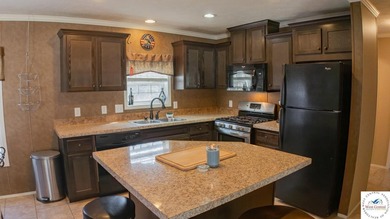 This charming 1,350 sq ft manufactured home sits on a permanent - photo 11