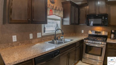 This charming 1,350 sq ft manufactured home sits on a permanent - photo 13