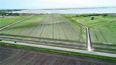 With 2,988.99' +/- of meandering Nueces Bay frontage along the - photo 2