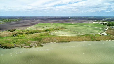 With 2,988.99' +/- of meandering Nueces Bay frontage along the - photo 5