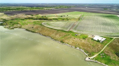 With 2,988.99' +/- of meandering Nueces Bay frontage along the - photo 7