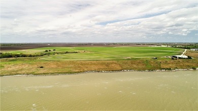 With 2,988.99' +/- of meandering Nueces Bay frontage along the - photo 8