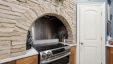 This spacious 6-bedroom, 4-bath home offers 4,230 square feet of - photo 16