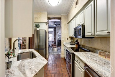 $60K PRICE ADJUSTMENT! QUINTESSENTIAL SAVANNAH. This fully - photo 31