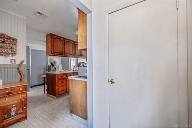 Welcome to this beautifully maintained expanded ranch in - photo 11