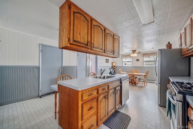 Welcome to this beautifully maintained expanded ranch in - photo 13