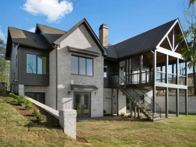 Stunning new construction positioned on a premium lot in the - photo 1