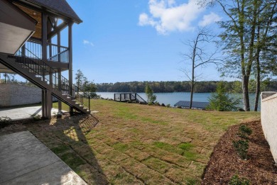 Stunning new construction positioned on a premium lot in the - photo 9