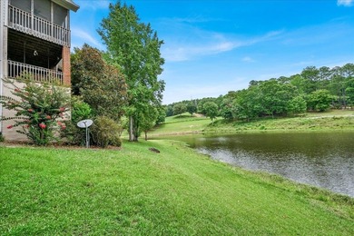 Brick home with a great view of golf course on one side and a