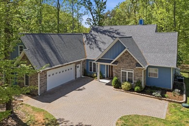 Stunning contemporary home w/seasonal lake views offers modern - photo 1