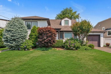 Welcome to this Beautifully Maintained Split-level Home in - photo 1