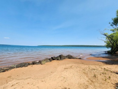 Set on approximately 220 feet of sandy Lake Superior shoreline - photo 4