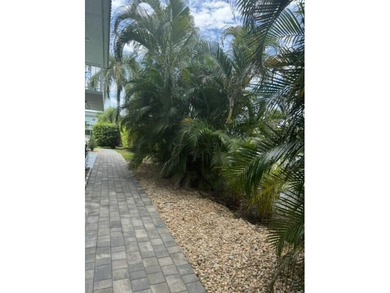 Welcome to this charming two-bedroom, two-bathroom condominium - photo 12