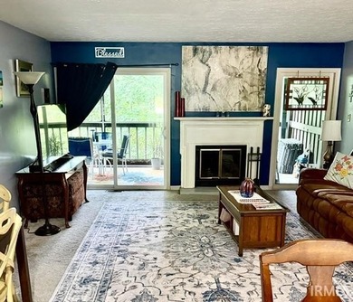 A rare find at Eagle pointe a ground level Waters Edge unit with - photo 3