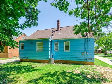This 3-bedroom, 2-bath bungalow offers a bright, open feel with - photo 3