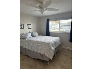 Welcome to this charming two-bedroom, two-bathroom condominium - photo 13