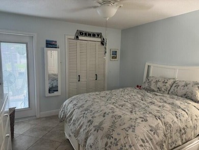 Welcome to this charming two-bedroom, two-bathroom condominium - photo 15