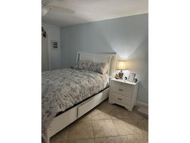 Welcome to this charming two-bedroom, two-bathroom condominium - photo 16