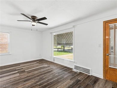 This 3-bedroom, 2-bath bungalow offers a bright, open feel with - photo 8