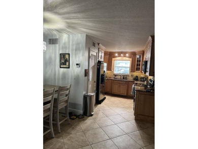 Welcome to this charming two-bedroom, two-bathroom condominium - photo 18