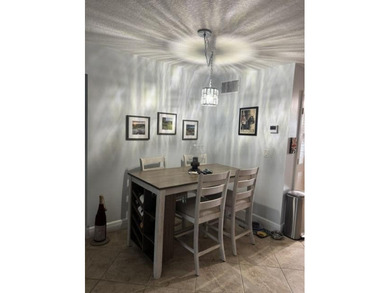 Welcome to this charming two-bedroom, two-bathroom condominium - photo 19