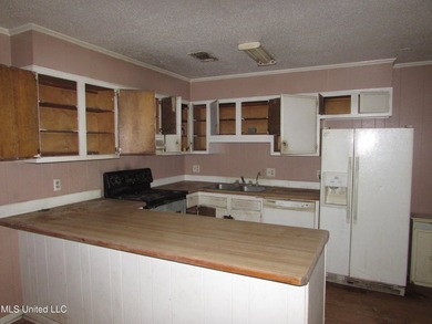 Great location for this 4/2 brick home. Has a newer roof but the - photo 3