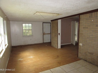 Great location for this 4/2 brick home. Has a newer roof but the - photo 4