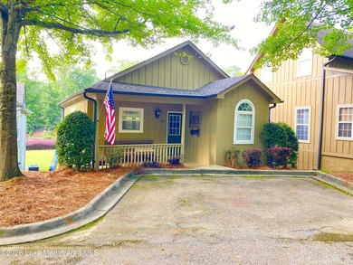 This 4-bedroom, 3.5-bath lakefront home offers effortless - photo 1