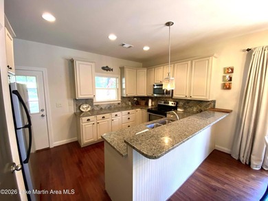 This 4-bedroom, 3.5-bath lakefront home offers effortless - photo 4