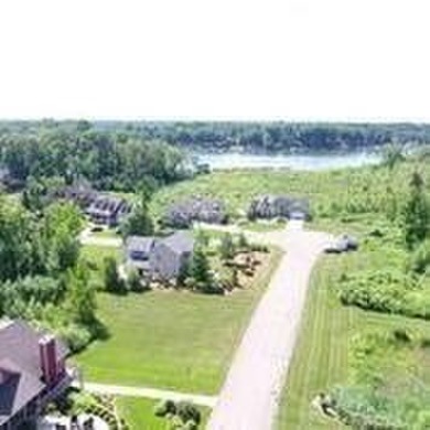 Nature's Cove is a gated community on beautiful Paw Paw Lake. As - photo 8