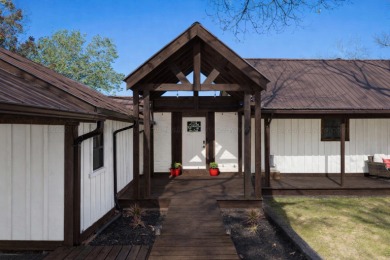 This charming two-story lake home offers stunning views and 1 - photo 1