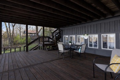 This charming two-story lake home offers stunning views and 1 - photo 2